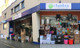 Banner split with two images of the Cambrian Place store from different angles